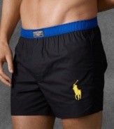 An essential, slim-fitting boxer is crafted from crisp cotton with a hint of stretch for unbeatable comfort and support. Ralph Lauren's Slim Fit features a shorter hem, slimmer cut and lower rise than the Classic Fit.