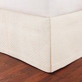 The clean-lined simplicity of this diamond pique blanket cover complements any style. It has a substantial weight, lustrous sheen and soft finish, and is sanforized to reduce shrinkage. Blanket cover and pillow shams are finished with a flanged border. The tailored bed skirt is pleated with a plain hem.