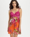 Beautiful cross-dyed lace frames the bodice of this elegant design, with a bold floral printed skirt in warm, vivid hues. Sweetheart necklineSupportive cupsThin adjustable ruched strapsEmpire waistAbout 33 from shoulder to hemPolyesterMachine washImported