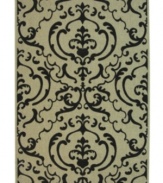 Safavieh takes classic beauty outside of the home with this elegant rug, created with a specially designed sisal weave. In eye-catching beige and black colorways, this engaging piece makes the most of any outdoor patio, porch or balcony. (Clearance)