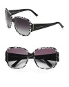 A feminine design inlayed with real Dolce & Gabbana lace on the front frame and solid temples. Available in black with grey gradient lens.Acetate frame with crystal lens UV 400 lens 100% UV protective Made in Italy