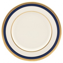 Inspired by privately commissioned presidential dinnerware, this fine china features stately navy bands and a gold border etched with patriotic stars.