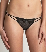 A sheer lo-rise bikini with lace front and ruching in back. Cotton gusset.