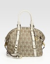 Iconic logo jacquard crafted in a soft duffel silhouette, finished with leather buckled straps and polished logo hardware.Leather double top handles, 5 dropRemovable adjustable shoulder strap, 13-15½ dropTop zip closureOne outside magnetic snap pocketProtective metal feetOne inside zip pocketOne inside open pocketCotton lining12¼W X 10¾H X 5DImported