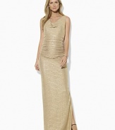 A draped cowl neckline imparts chic, sophisticated style to an elegant evening gown, tailored from softly crinkled jersey with glistening metallic specks for an eye-catching appeal.