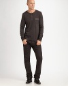 Lightweight design works great alone or as a layering piece during the cold winter months.CrewneckThree-button placketChest patch pocketCottonDry cleanImported
