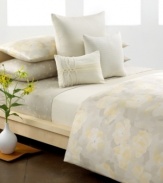 At once cheerful and calming, Calvin Klein's Poppy comforter set transforms your space into a beautiful oasis with watercolor florals cream and yellow on soft cotton sateen. Reverses to self.