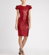 This form-fitting, festive design is encrusted with dazzling allover sequins.Jewel necklineRuffled drape short sleevesAllover sequinsConcealed back zipFully linedAbout 19 from natural waistSilkDry cleanImportedModel shown is 5'10 (177cm) wearing US size 4. 