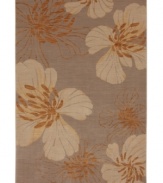 Wildflower silhouettes in soft tones bring a modern feel to your floors in the Carmel Del Ray area rug from Karastan. Thick and resilient underfoot, this plush piece is woven from 2-ply nylon pile, ensuring easy care and long-lasting wear.