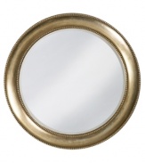 Give any room an otherworldly glow with the simply timeless Saturn wall mirror. A round frame in burnished silver with red highlights is edged in classic beading.