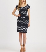 Pretty polka dots pop on this fitted sheath finished with drop-waist detailing.BoatneckCap sleevesBodice dartsCenter back zipperAbout 23 from natural waist75% cotton/25% polyesterDry cleanMade in USA of imported fabricModel shown is 5'9 (175cm) wearing US size 4.