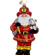 Santa to the rescue! Dressed in full uniform and carrying a hose and a cute little pup, Santa saves the day in this handcrafted, mouth-blown glass ornament from Christopher Radko. Perfect for the fireman in your family.