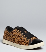 Get a running start on the exotics trend in these leopard print DKNY sneakers. With trendy black patent cap toes, they have enough edge to keep things cool.