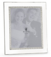 This silver-plated picture frame displays the classic elegance of Waterford. Makes a thoughtful gift.
