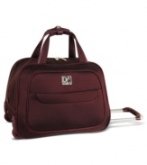Good company for a lifetime of travel. A versatile shape & size, this style setter takes charge of packing up for quick trips out of town or weekend getaways. Ready to roll or to hang from your shoulder, Diane von Furstenberg's duffel features a two-tone exterior and a fully-stocked interior with laptop compartment and zipper pocket. 10-year warranty. (Clearance)