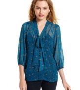 Bow design adds vintage inspiration to this sheer, floral-print top from Eyeshadow!
