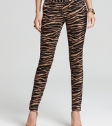 Send your style on an exotic quest with these zebra-print Michael Kors skinny pants. Elevate the look with sleek heels and golden accents for untamed glamour.