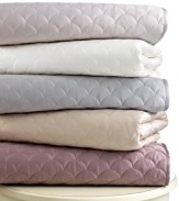 Get cozy! The Crescent Moon sham from Barbara Barry provides an extra layer of comfort to your bed with irresistibly soft, quilted elements. A landscape of overlapping half-moon designs create an understated, elegant appearance.