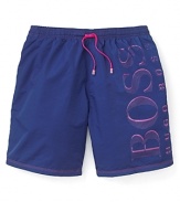 Catch the wave with an exciting contrast of colors on this fun-in-the-sun pair of swim trunks from BOSS Black.
