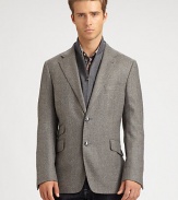 Expect the unexpected with this classically-inspired three-button blazer shaped in the supreme softness of a wool and cashmere blend, featuring a zip-out front vest panel and an additional front ticket pocket.Button-frontNotch lapelChest welt, waist flap pocketsSide vents86% wool/14% polyesterDry cleanMade in Italy