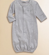 Pamper your little one with this soft, comfy and striped baby sack that converts to a coverall for easy dressing.CrewneckLong sleevesFront snap closureSnap bottomLegs have elastic cuffs94% pima cotton/6% polyesterMachine washImported Please note: Number of snaps may vary depending on size ordered.