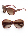 THE LOOKRounded square silhouetteVariegated handmade acetate framesEtched grid and Austrian crystals on temples, arms and tipsTHE COLORBrown and amethyst with brown gradient lensORIGINImported