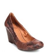 High-fashion snake-textured leather meets low-key comfortable wedges in this Lucky Brand design.