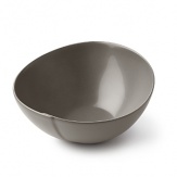 Borrowing from nature, this serving bowl has a highly glossed surface and unusual contours, creating an interesting silhouette - a DVF signature - on the table.