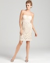 An intricately pleated bodice tops off a richly embellished skirt on this Sue Wong dress.