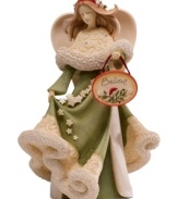 Utterly charming upon a mantle or table, a row of stars cascade down the finely crafted dress of this angel figurine, embellished with sparkling crystals and the seasonal message: Believe.