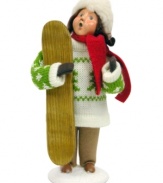 She's graduated from the bunny slopes and now this snowboarder, clad in a can't-miss Christmas sweater, stands in awe of the snow-capped mountains around her. The perfect Byers' Choice figurine for ski- and snowboarding families!