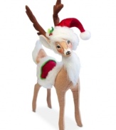 Ready to make the rounds, this cozy reindeer dons a velvety red hat and blanket to match Santa's holiday best. With the soft, flexible features and unmistakable style of Annalee dolls.