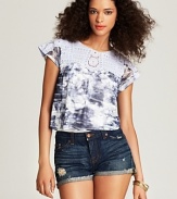 A Free People tie-dye tee decorated with crochet lace at the yoke and shoulders is a playful addition to summer--perfect when paired with cut-off denim or worn over an itty-bitty bikini.