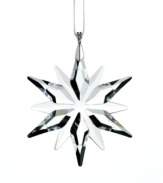 This exquisite clear crystal ornament adds a delicate touch of sparkle to your festive decorations. It comes on a white satin ribbon and the silhouette reflects the Christmas Ornament Annual Edition 2011. For even more impact, hang several Little Stars together on your tree or in a window.