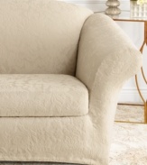 The perfect mix of form and fashion is found in this sumptuous stretch jacquard slipcover from Sure Fit. A raised damask pattern offers sleek texture for a clever update while its allover stretchy fabric lends a secure fit that tucks in and stays put!