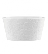 Darling florals are intricately sculpted in this white porcelain candy bowl for a clean, beautiful way to present your most delectable treats. From Lenox. Qualifies for Rebate