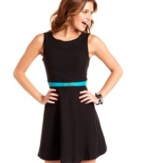 BCX's dress hides a sexy surprise -- there's a dramatic plunging back neckline! A bold, bright belt adds a pop of color to the mix.