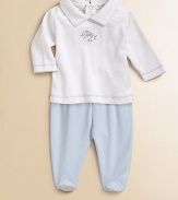 Crafted in lush pima cotton, a newborn's essential collared top and footed pants set features birdie embroidery and contrast stitching. Top Point collarLong sleevesBack snaps Pants Elastic waistbandPima cottonMachine washImported Please note: Number of snaps may vary depending on size ordered. 