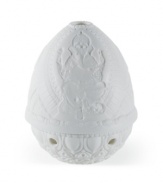 Honor Lord Ganesha with this delicately etched lithopane figurine and votive holder from Lladro. Place a candle inside to bring all of the incredible detail to light.