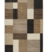 A myriad of variegated shapes in neutral hues collect upon this Taylor Geometrics rug, offering a truly unique an strikingly modern design. Crafted on a Wilton power loom of heat-set polypropylene for ultimate durability, no matter where it's placed.
