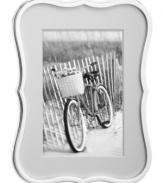 Shiny silver plate flows in graceful curves around the Crown Point picture frame, accenting a personal gallery with the modern polish of kate spade new york. Its white mat provides a crisp, clean contrast to any photo.