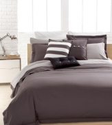 Clean, casual & comfortable. The Solid Grey Brushed Twill comforter set from Lacoste is essential to any well-dressed bed. Brushed twill fabric and over-sized buttoned accents create a classic, preppy look.