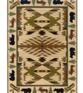 A lively rug that evokes the Alaskan wilderness, this traditional floor covering from Sphinx comes complete with a Native American motif bordered by illustrated moose, bears, canoes and more. Made from soft polypropylene for superb durability.