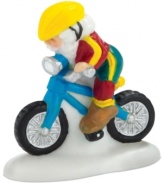Accustomed to the snow, this daring commuter braves the streets to Santa's workshop on an electric-blue bike. A whimsical figurine from North Pole Village, also by Department 56.