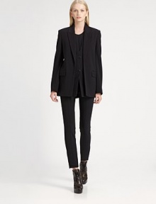 Underlying front placket adds a layered effect to this oversized wool-rich blazer. Notched collarButton placket underlayLong sleevesFront flap pocketsBack slitAbout 29 from shoulder to hemVirgin wool/nylon/LycraDry cleanImported of Italian fabricSIZE & FITModel shown is 5'10 (177cm) wearing US size 4. Underlying front placket adds a layered effect to this oversized wool-rich blazer. Notched collarButton placket underlayLong sleevesFront flap pocketsBack slitAbout 29 from shoulder to hemVirgin wool/nylon/LycraDry cleanImported of Italian fabricSIZE & FITModel shown is 5'10 (177cm) wearing US size 4.