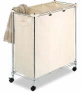 The ultimate in organization and conveneince! Keep your laundry tidy and accessible with three canvas compartments on a sleek, rolling metal stand.