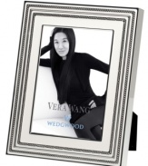 Add new elegance to beautiful memories with Vera Wang's With Love Blanc picture frame. Geometric detail lends metallic shimmer to creamy white enamel in a home accent that invokes modern and deco design.