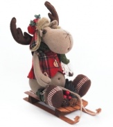 Ready for sledding in a plaid flap hat and vest, this frisky holiday moose is ready for whatever the slopes will bring. A cheery gift from Napco.