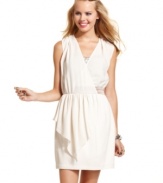 Sweet and chic, with a ruffled peplum and back-flaunting cutout, XOXO's sleeveless party dress is just right for the holidays.