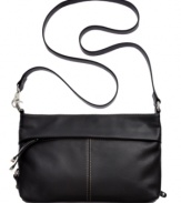 Wear with t-shirt and jeans or your favorite frilly frock, this versatile crossbody from Tignanello is the ultimate accessory. Clean lines, buttery-soft leather and subtle detail stitching grace the outside, while plenty of pockets and card slots inside can make your life feel more pulled together.